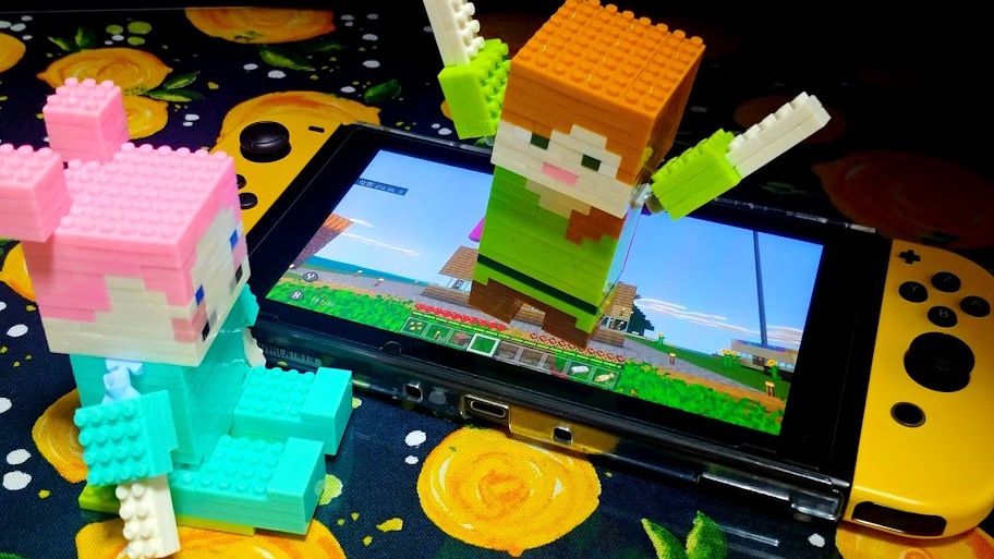 Switchから上半身が出た根岸。「まちくたびれ みした」